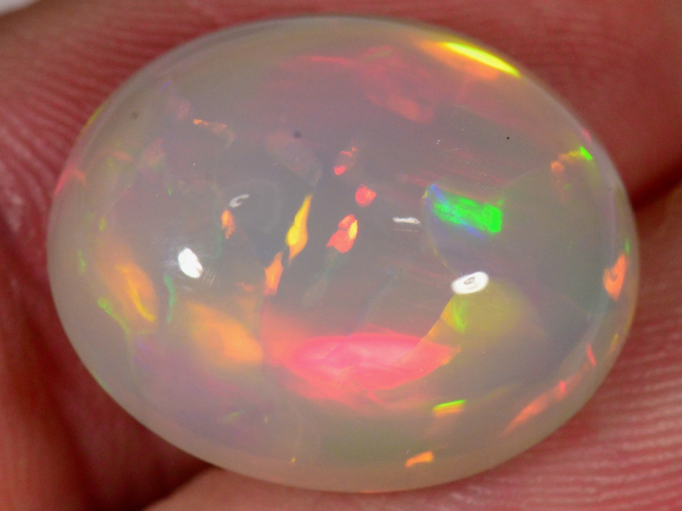 13.5 Carat Greyish Oval-Cut Ethiopian Welo Opal — natural untreated Ethiopian Welo opal
