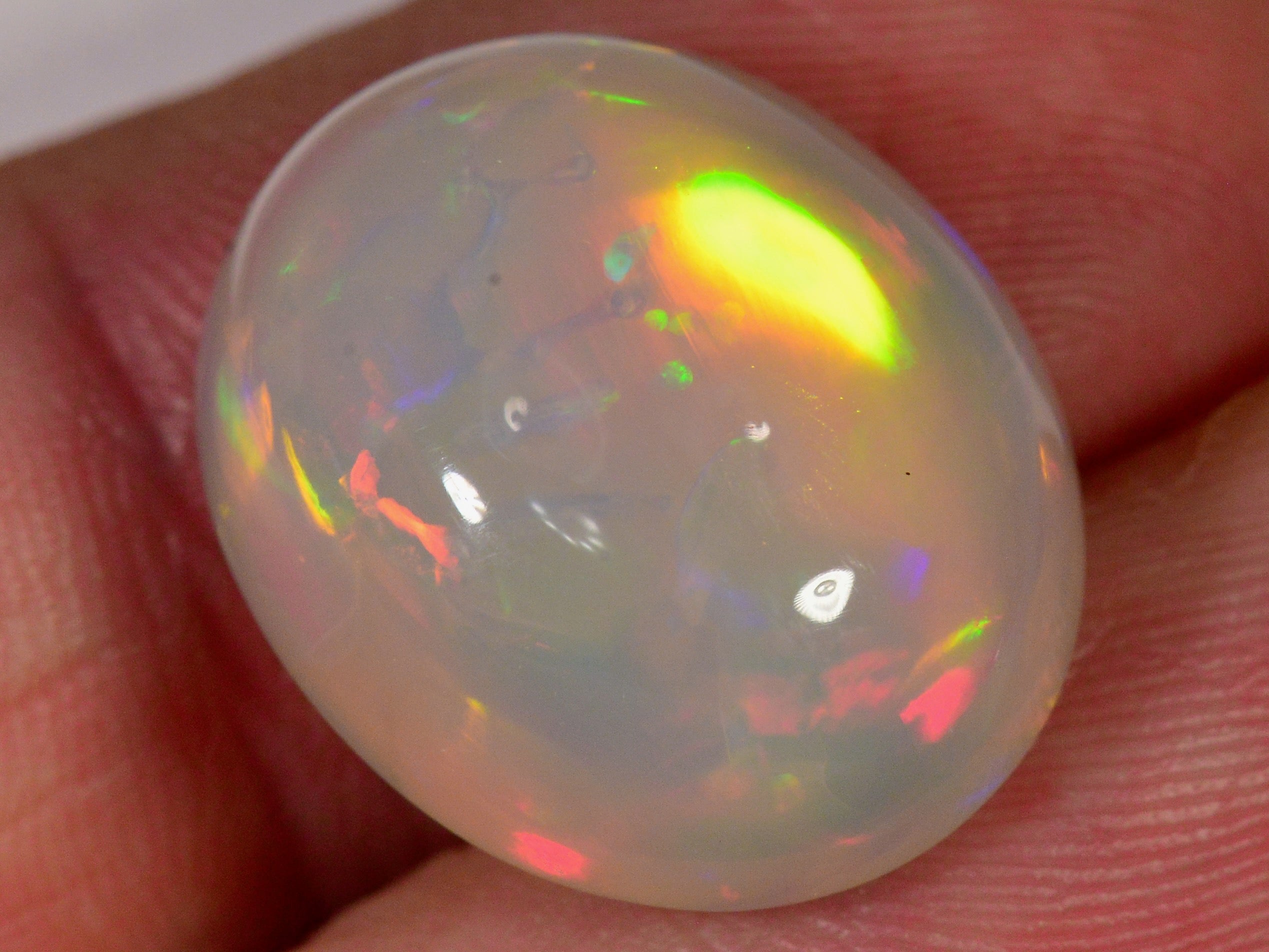 13.5 Carat Greyish Oval-Cut Ethiopian Welo Opal — natural untreated Ethiopian Welo opal