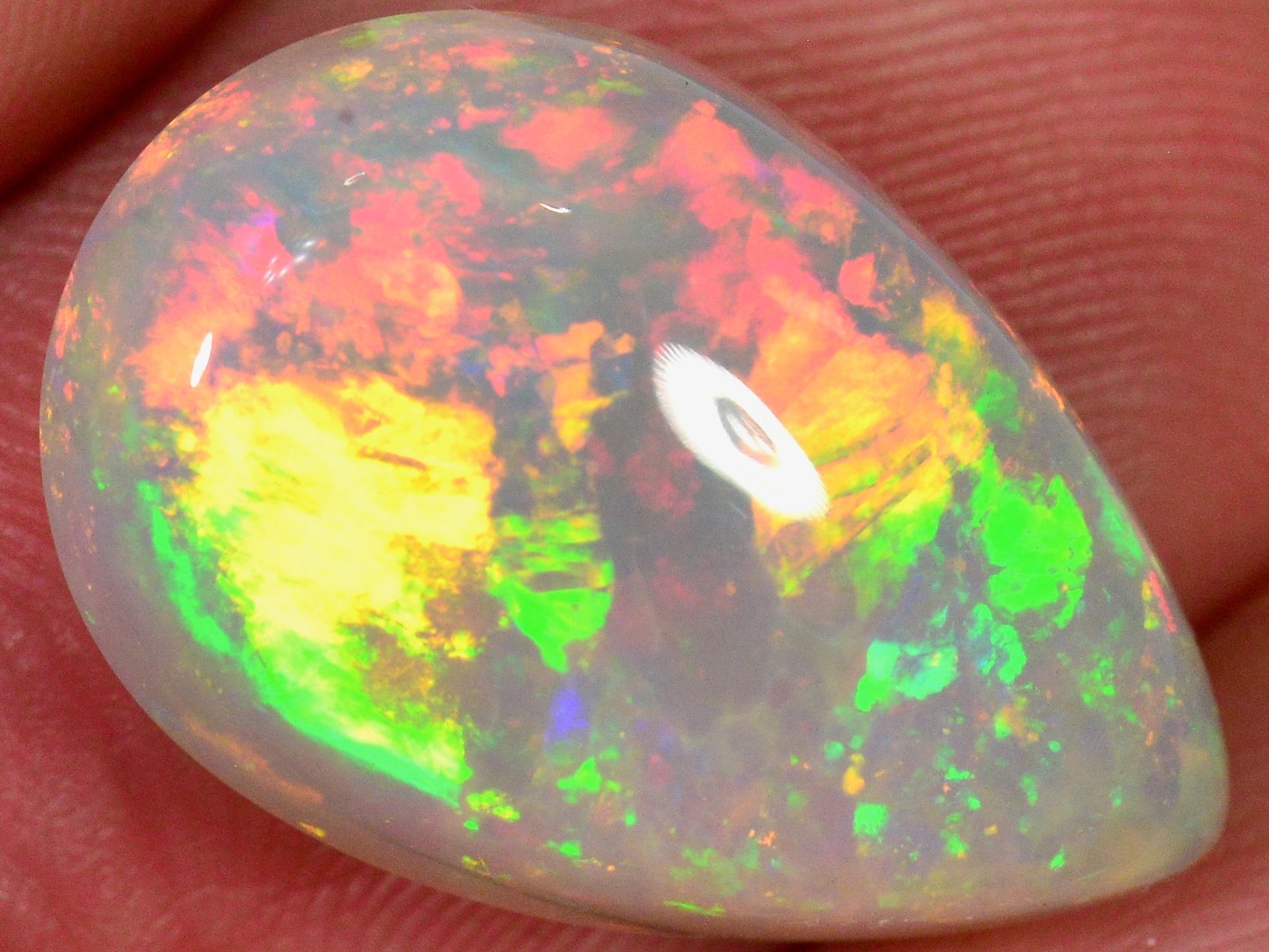 7.2 Karat - Tropfenförmiger Äthiopischer Welo Opal mit Streifenmuster - DeinOpal