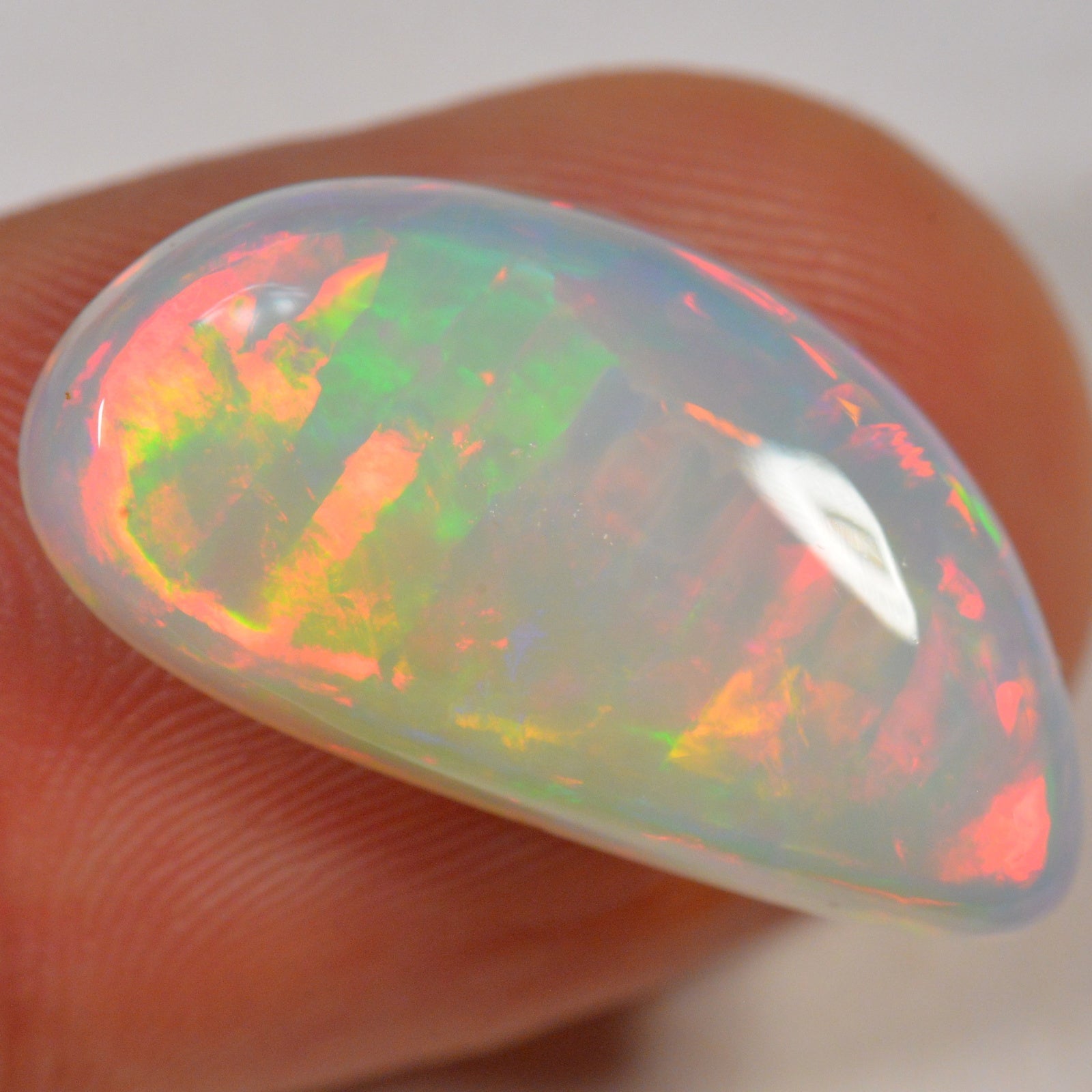 8.3 Carat Light Ethiopian Welo Opal with Striped Pattern — natural untreated Ethiopian Welo opal