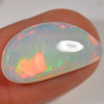 8.3 Carat Light Ethiopian Welo Opal with Striped Pattern — natural untreated Ethiopian Welo opal