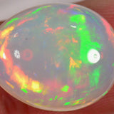 7.3 carat - Teardrop-shaped Ethiopian Welo Opal with intense play of colors 