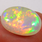 8.3 Carat - Bright Oval Ethiopian Welo Opal — natural untreated Ethiopian Welo opal